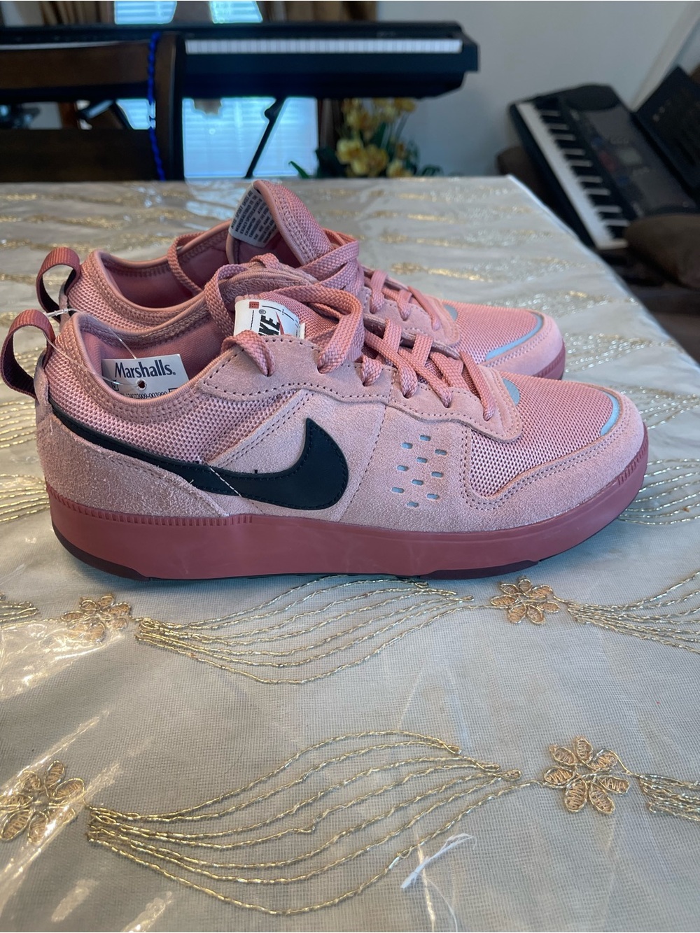 Nike Pink Low-Top Sneakers with Black Swoosh